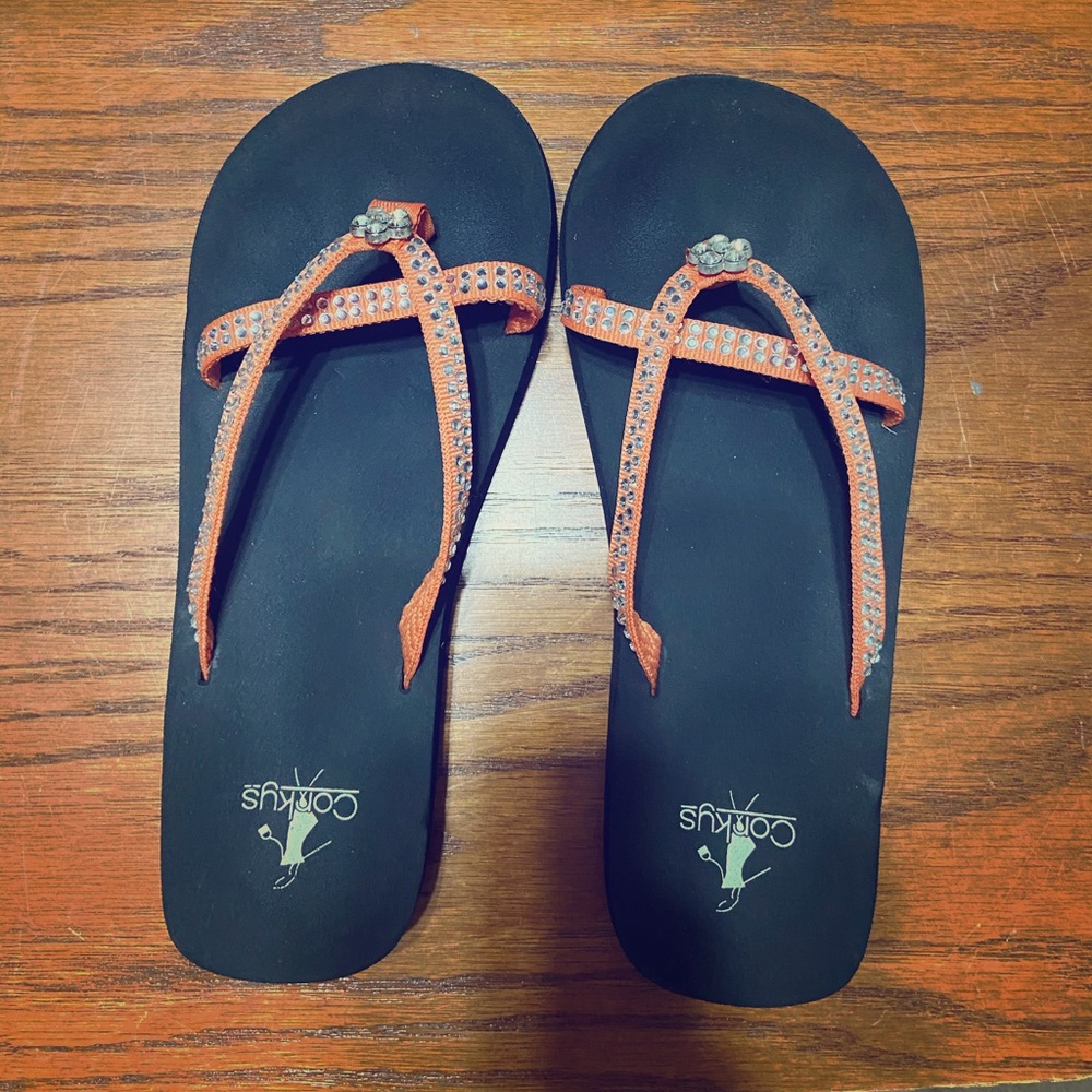 Corky’s flip flops
